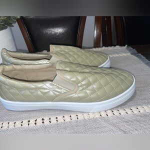 New size 11 woman’s light green slip on shoes